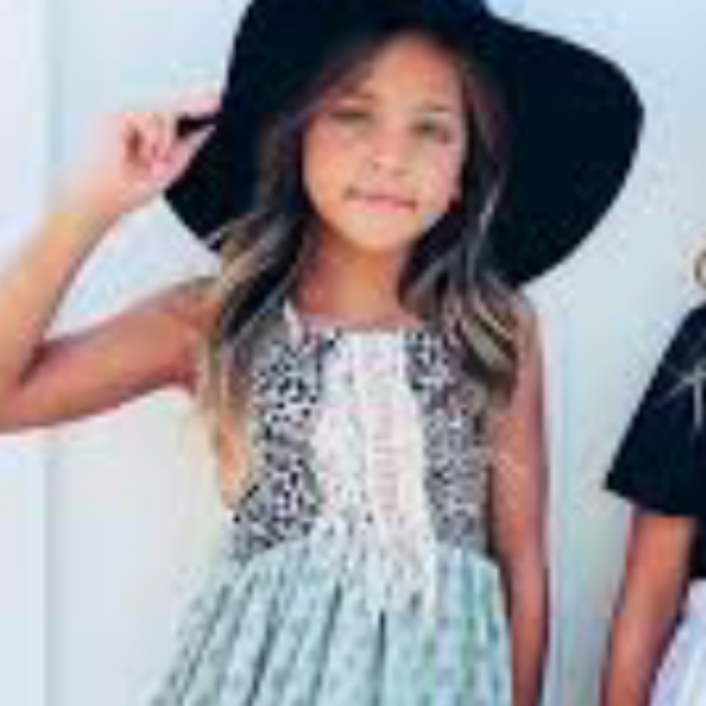 Blue dress black floppy hat